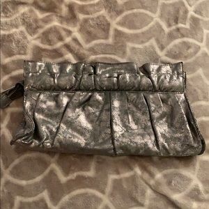 Express silver clutch